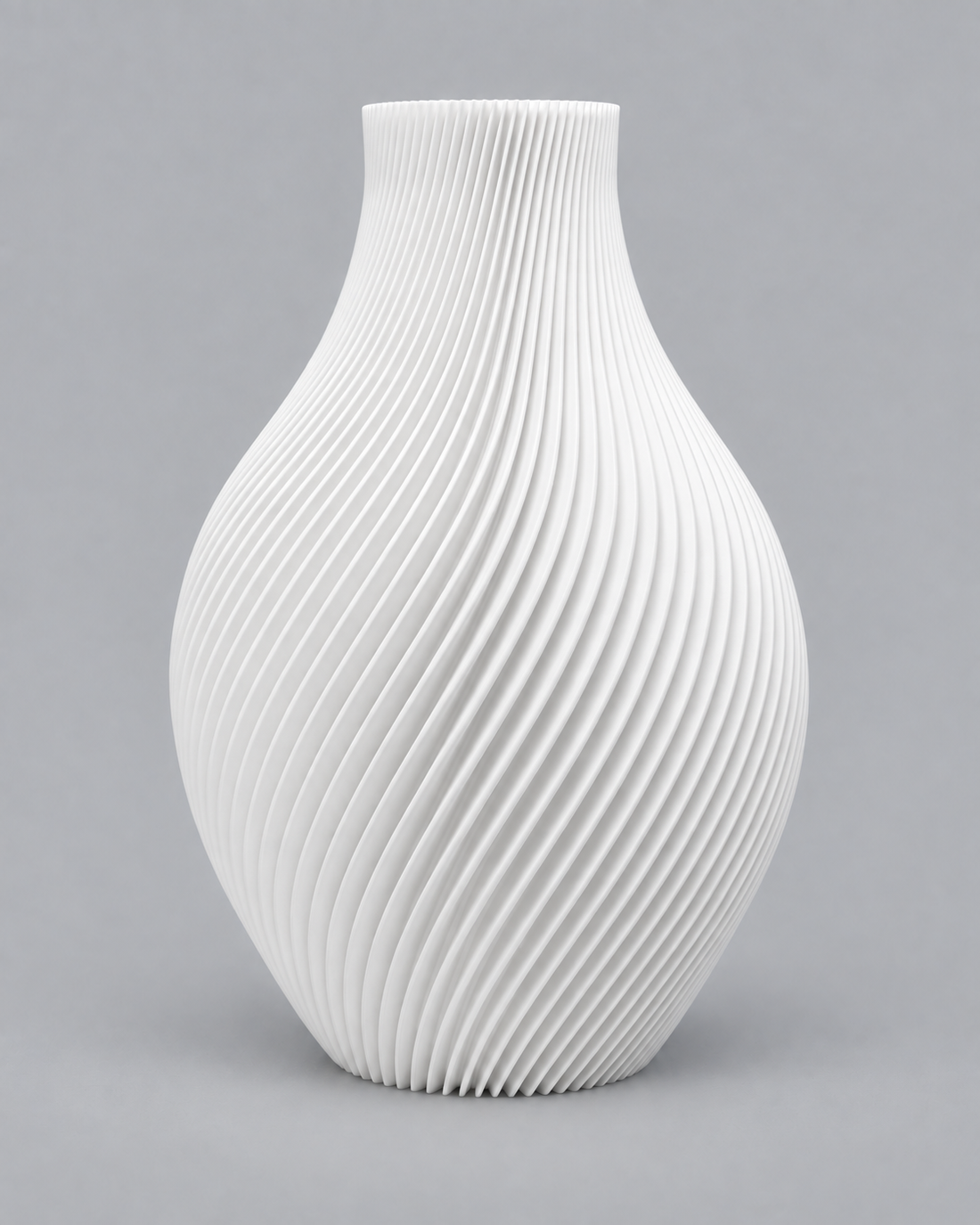 White Sora vase, a round 3D-printed vase with fine spiral ribs and a narrow neck
