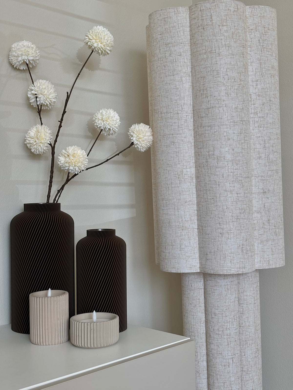 Brown SILO vases with white flowers
