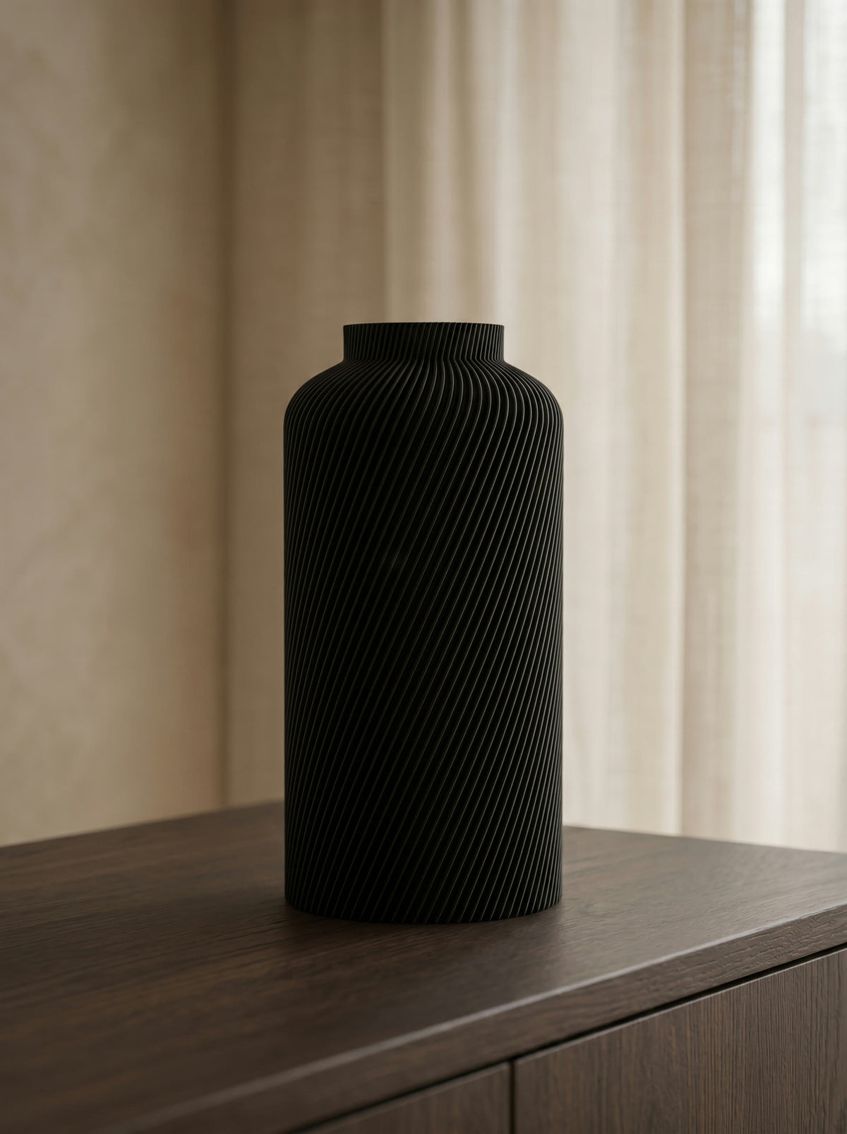 Black SILO vase on a sideboard